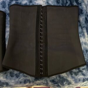 Elegant Black Women's Bodysuit by [Brand]